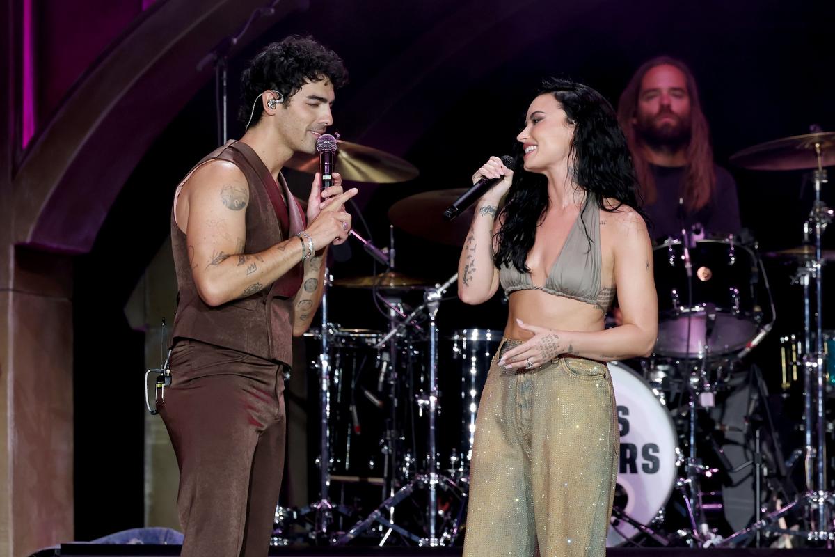 Joe Jonas and Demi Lovato perform onstage during the Jonas Brothers: JONAS20 Greetings From Your Hometown tour kick off at Met Life Stadium on August 10, 2025 in East Rutherford, New Jersey.
