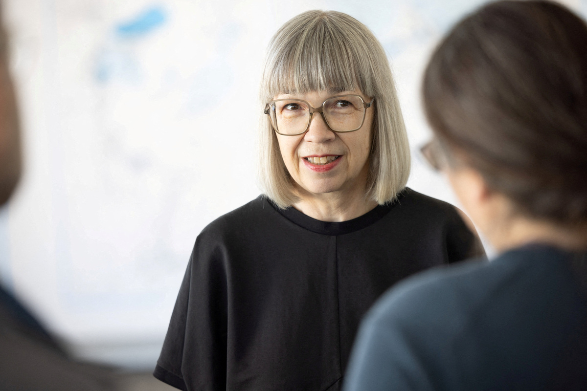 Barbara Steiner, director of Bauhaus Dessau Foundation, speaks to people in the Bauhaus Dessau, a UNESCO World Heritage Site designed by Walter Gropius and built between 1925 and 1926, in Dessau, Germany June 17, 2026. REUTERS/Axel Schmidt