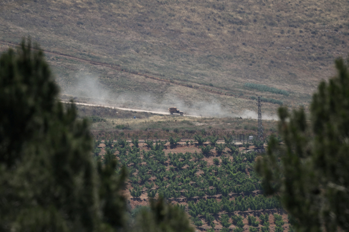 An Israeli military vehicle on a road in southern Lebanon, near the Israel-Lebanon border, as seen from northern Israel, June 2, 2026. REUTERS/Shir Torem     TPX IMAGES OF THE DAY