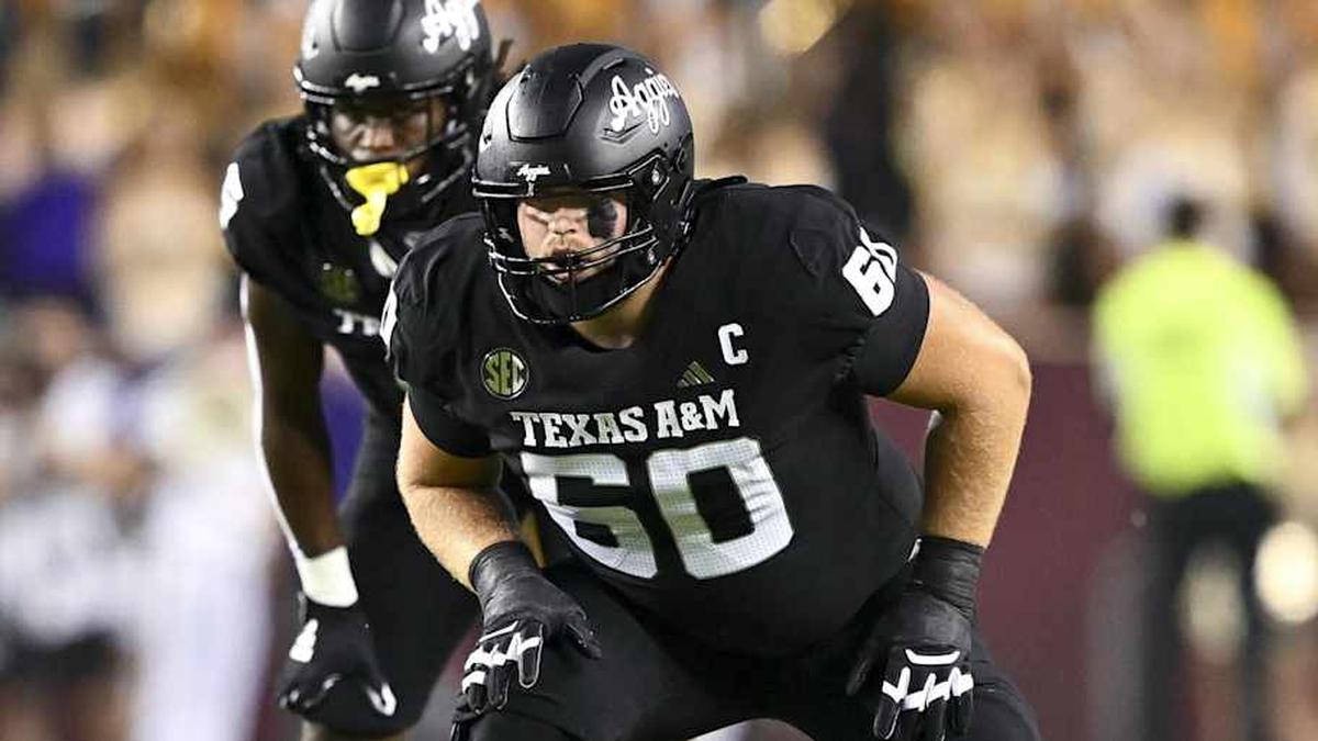 Oct 26, 2024; College Station, Texas, USA; Texas A&M Aggies offensive lineman Trey Zuhn III (60) lines up during the second quarter against the LSU Tigers. The Aggies defeated the Tigers 38-23 at Kyle Field. Mandatory Credit: Maria Lysaker-Imagn Images. | Maria Lysaker-Imagn Images 