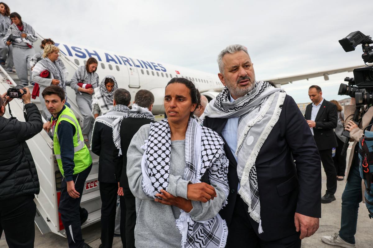 An injured French activist from the Gaza-bound Global Sumud Flotilla, detained by Israeli forces after their vessels were intercepted in international waters in the Mediterranean, looks on upon arrival at Istanbul Airport, Turkey, May 21, 2026. REUTERS/Murad Sezer