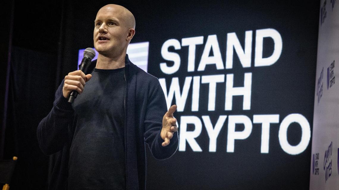 Crypto exchange Coinbase to lay off 14% of staff as AI reshapes work