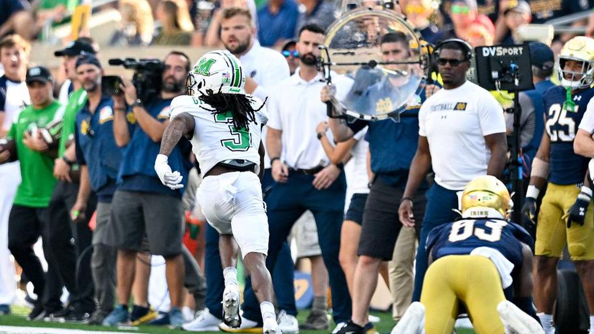  Sep 10, 2022; South Bend, Indiana, USA; Marshall Thundering Herd defensive back Steven Gilmore (3) runs an interception back for a touchdown in the fourth quarter against the Notre Dame Fighting Irish at Notre Dame Stadium. | Matt Cashore-Imagn Images 