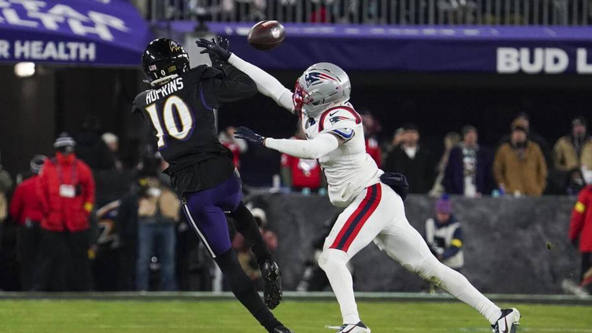  Dec 21, 2025; Baltimore, Maryland, USA; Baltimore Ravens wide receiver Deandre Hopkins (10) makes a catch against New England Patriots cornerback Carlton Davis III (7) during the second half of the game at M&T Bank Stadium. Mandatory Credit: James Lang-Imagn Images | James Lang-Imagn Images 