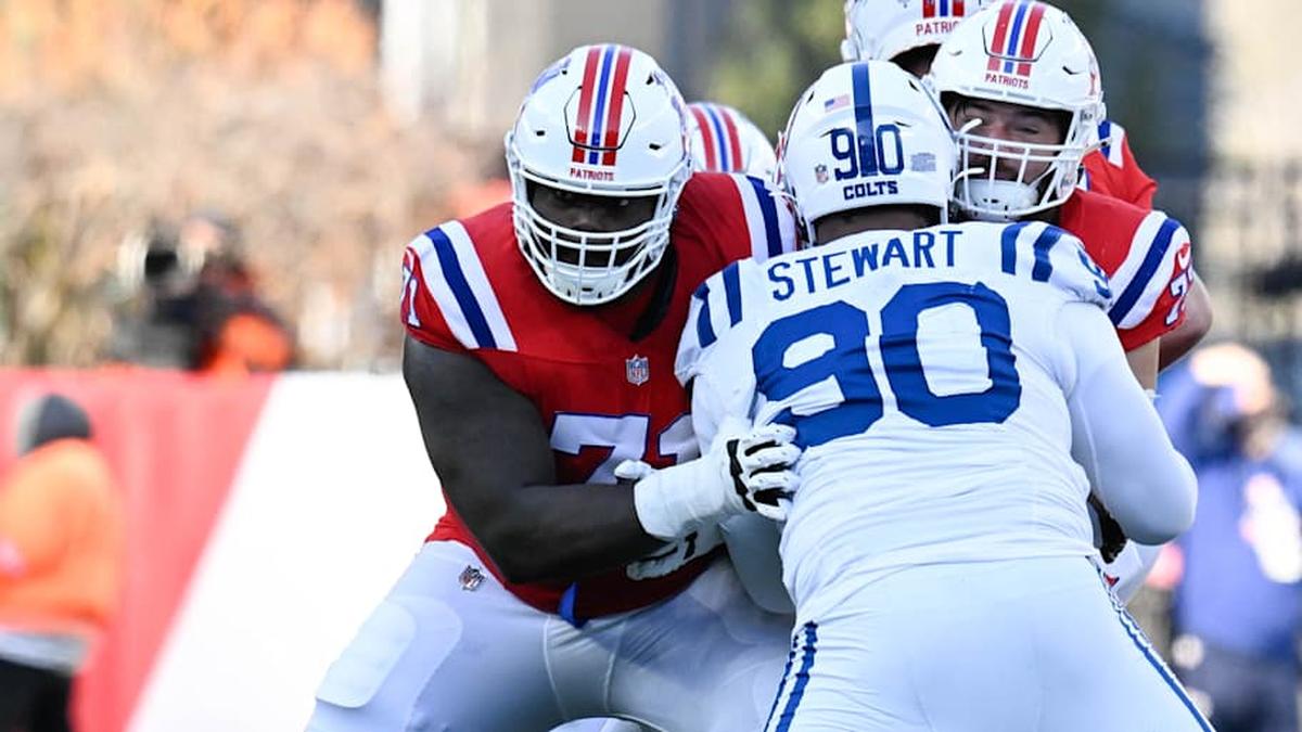  Dec 1, 2024; Foxborough, Massachusetts, USA; New England Patriots offensive tackle Mike Onwenu (71) blocks Indianapolis Colts defensive tackle Grover Stewart (90) during the first half at Gillette Stadium. Mandatory Credit: Eric Canha-Imagn Images | Eric Canha-Imagn Images 