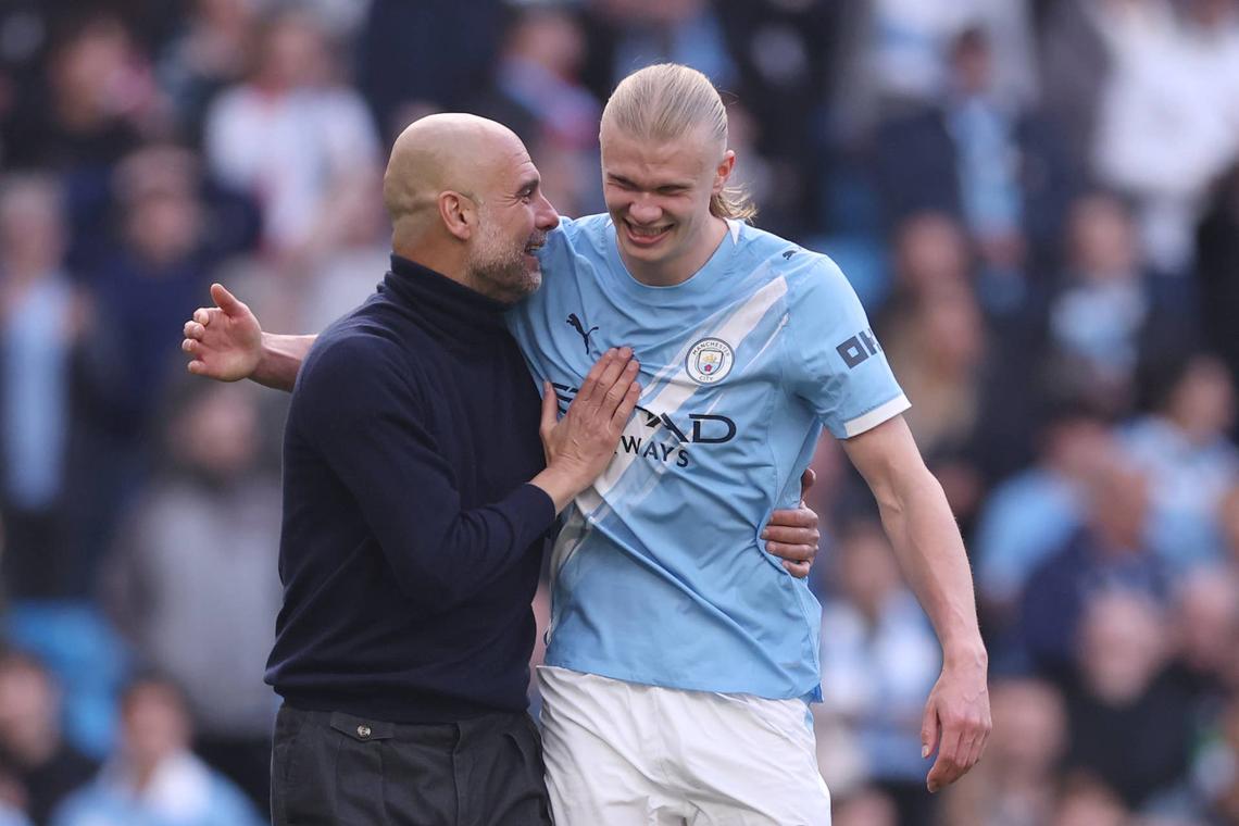  Pep Guardiola and Erling Haaland celebrate victory following the Premier League match between Manchester City and Arsenal. Photo by Carl Recine/Getty Images