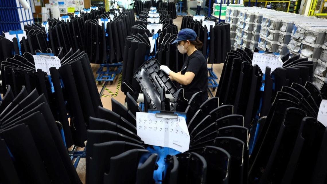 Japan manufacturers' mood edges up in May, services sector slips: Reuters poll 