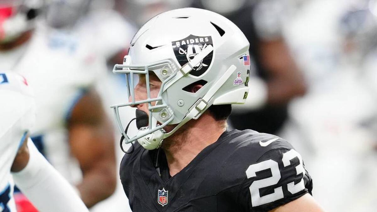  Oct 12, 2025; Paradise, Nevada, USA; Las Vegas Raiders running back Dylan Laube (23) runs the ball during the second half against the Tennessee Titans at Allegiant Stadium. Mandatory Credit: Stephen R. Sylvanie-Imagn Images | Stephen R. Sylvanie-Imagn Images 