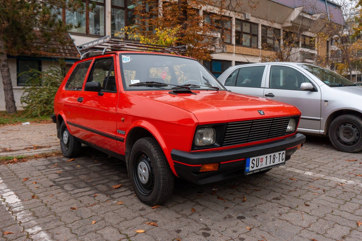 Perfect condition or restored YUGO Koral (Zastava Koral, Yugo 45, 55) in red color is parked in Subotica, Serbia, 01.11.2022