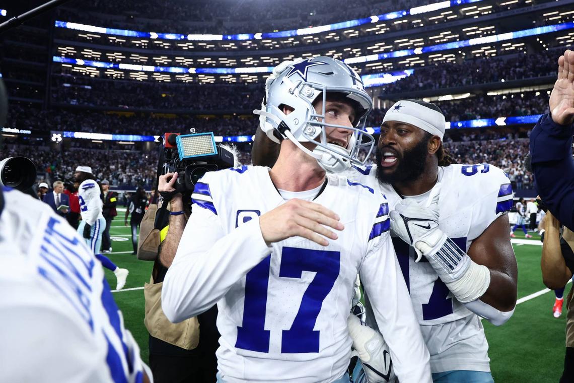  Nov 23, 2025; Arlington, Texas, USA; Dallas Cowboys defensive tackle Osa Odighizuwa (97) congratulates kicker Brandon Aubrey (17) after the game against the Philadelphia Eagles at AT&T Stadium. Mandatory Credit: Kevin Jairaj-Imagn Images 