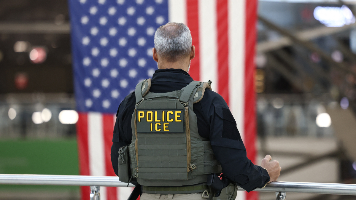 US-POLITICS-TRANSPORTATION-AVIATION. A US Immigrations and Customs Enforcement (ICE) stands watch at a security checkpoint at John F. Kennedy International Airport in New York, on March 23, 2026.