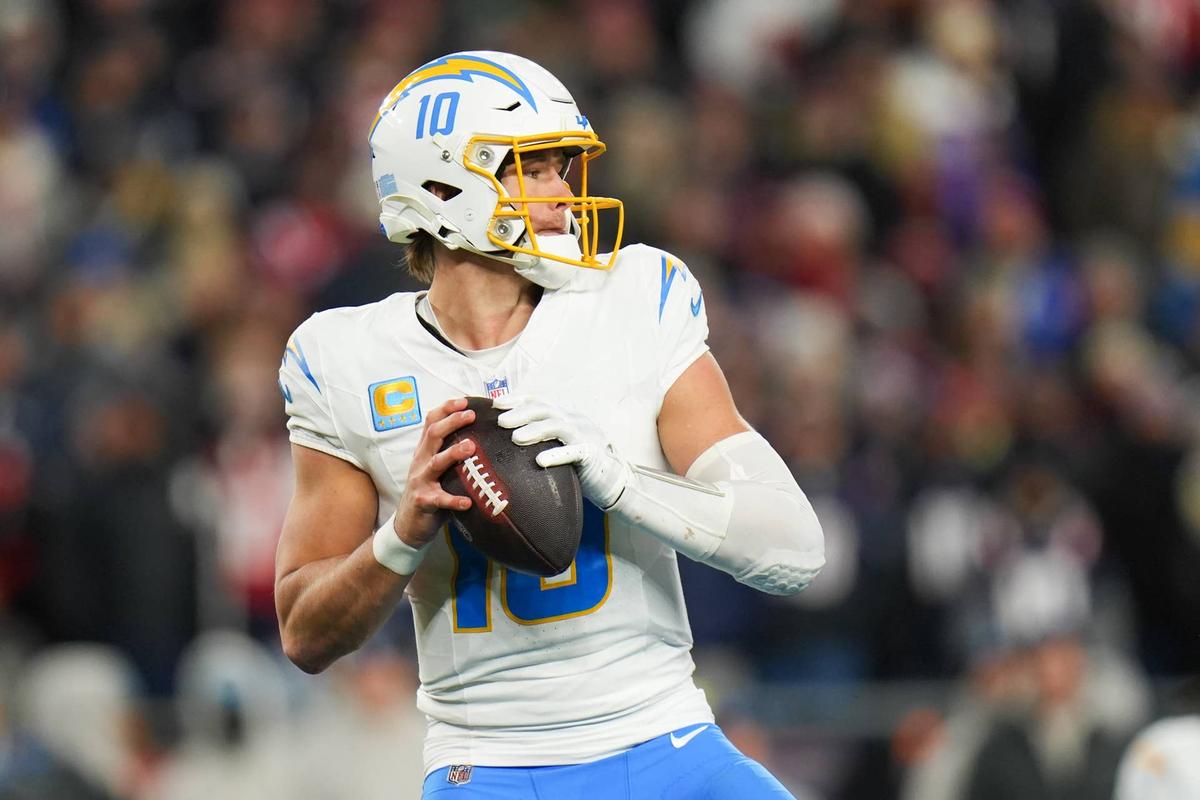  Los Angeles Chargers quarterback Justin Herbert looks to pass against the New England Patriots in an AFC Wild Card Round game at Gillette Stadium. David Butler II-Imagn Images