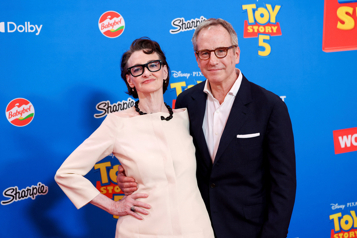Joan Cusack and her husband Richard Burke attend a premiere for the film Toy Story 5 in Los Angeles, California, U.S., June 9, 2026. REUTERS/Mario Anzuoni