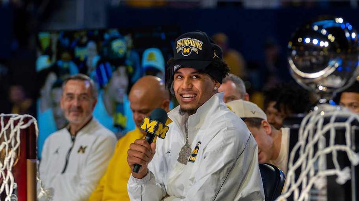  Michigan Wolverines player Yaxel Lendeborg speaks during a celebration honoring the team's NCAA men's basketball national championship at Crisler Center in Ann Arbor on Saturday, April 11, 2026. | David Rodriguez Muñoz / USA TODAY NETWORK via Imagn Images 