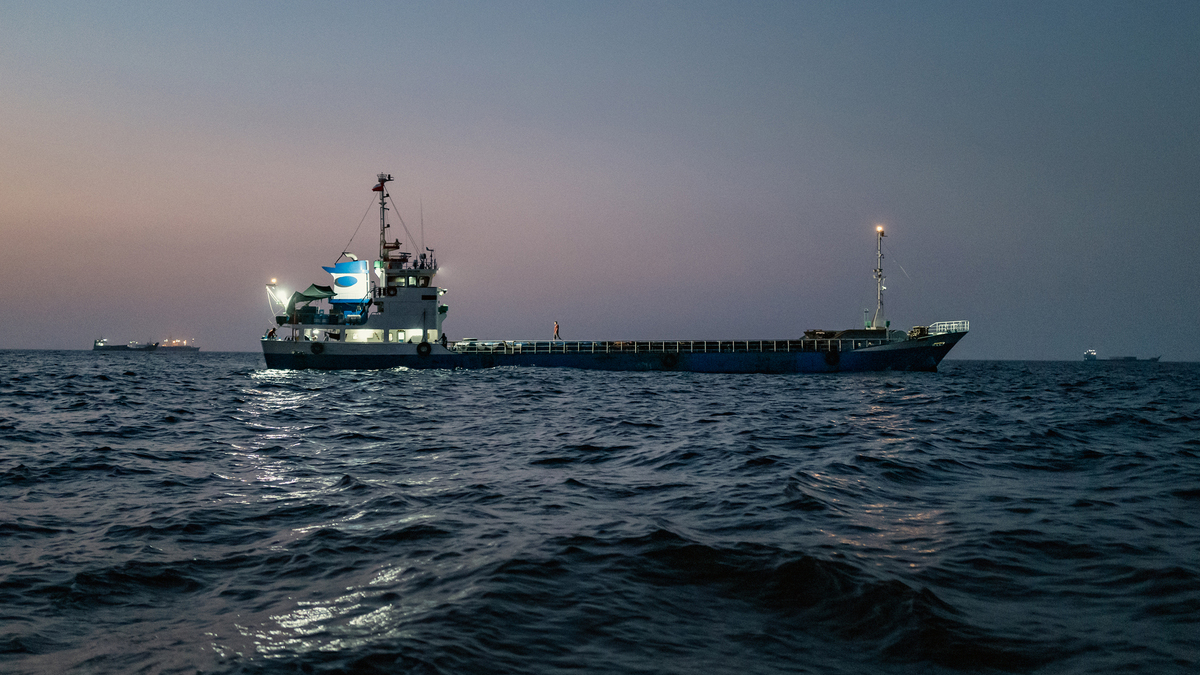 Oil tankers and cargo vessels sit anchored off Port Sultan Qaboos near the Strait of Hormuz on June 21, 2026, in Muscat, Oman. (Elke Scholiers/Getty Images/TNS)