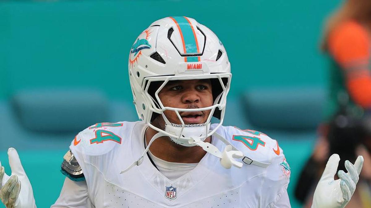  Nov 24, 2024; Miami Gardens, Florida, USA; Miami Dolphins linebacker Chop Robinson (44) reacts after attempting to recover a fumble against the New England Patriots during the second quarter at Hard Rock Stadium. Mandatory Credit: Sam Navarro-Imagn Images | Sam Navarro-Imagn Images 