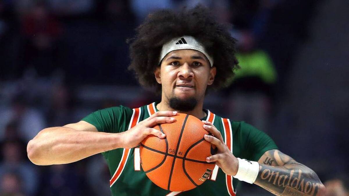 Dec 2, 2025; Oxford, Mississippi, USA; Miami Hurricanes guard Tre Donaldson (3) reacts during the first half against the Mississippi Rebels at The Sandy and John Black Pavilion at Ole Miss. Mandatory Credit: Petre Thomas-Imagn Images | IMAGN IMAGES via Reuters Connect 