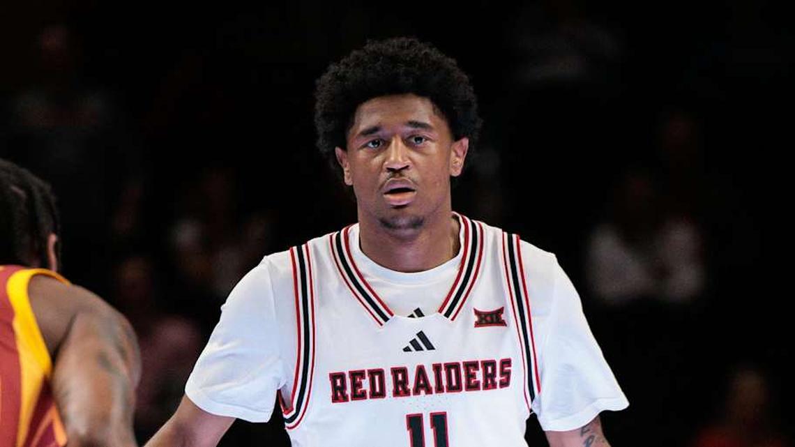  Mar 12, 2026; Kansas City, MO, USA; Texas Tech Red Raiders guard Jaylen Petty (11) brings the ball up court around Iowa State Cyclones guard Jamarion Batemon (1) during the first half at T-Mobile Center. Mandatory Credit: William Purnell-Imagn Images | William Purnell-Imagn Images 