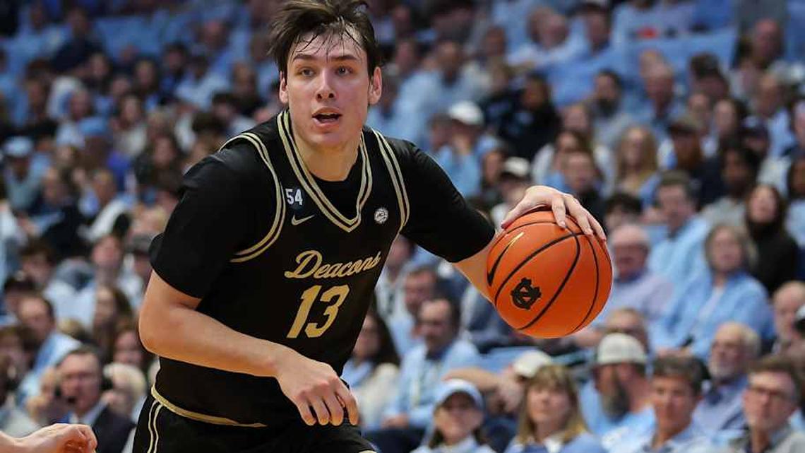  Jan 10, 2026; Chapel Hill, North Carolina, USA; Wake Forest Demon Deacons forward Cooper Schwieger (13) drives the ball against the Wake Forest Demon Deacons during the first half at Dean E. Smith Center. Mandatory Credit: Cory Knowlton-Imagn Images | Cory Knowlton-Imagn Images 