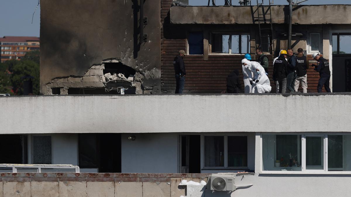 Romanian law enforcement officers work at the site of an explosion in a residential block of flats following a reported drone strike near the border with Ukraine, in Galati, Romania, May 29, 2026. Inquam Photos/George Calin via REUTERS