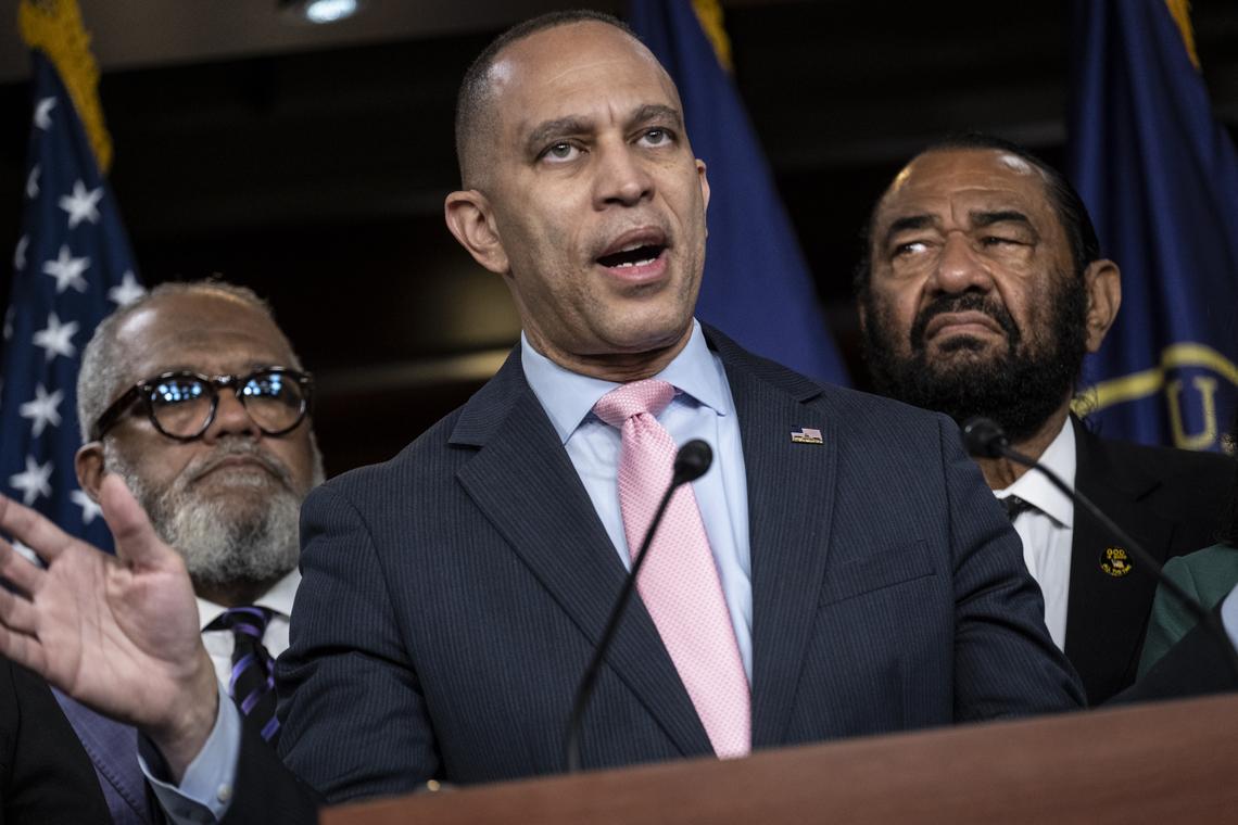 House Minority Leader Hakeem Jeffries (D-N.Y.) and members of the Congressional Black Caucus respond to a Supreme Court ruling that weakened the Voting Rights Act, in Washington on Wednesday, April 29, 2026. Jeffries tied the decision to the Trump administration's efforts to roll back initiatives promoting diversity, equity and inclusion. "This isn't even really the Roberts court, it's the Trump court," Jeffries said. With him are Rep. Benny Thompson (D-Miss.), left, and Rep. Al Green (D-Texas.) (Pete Marovich/The New York Times)