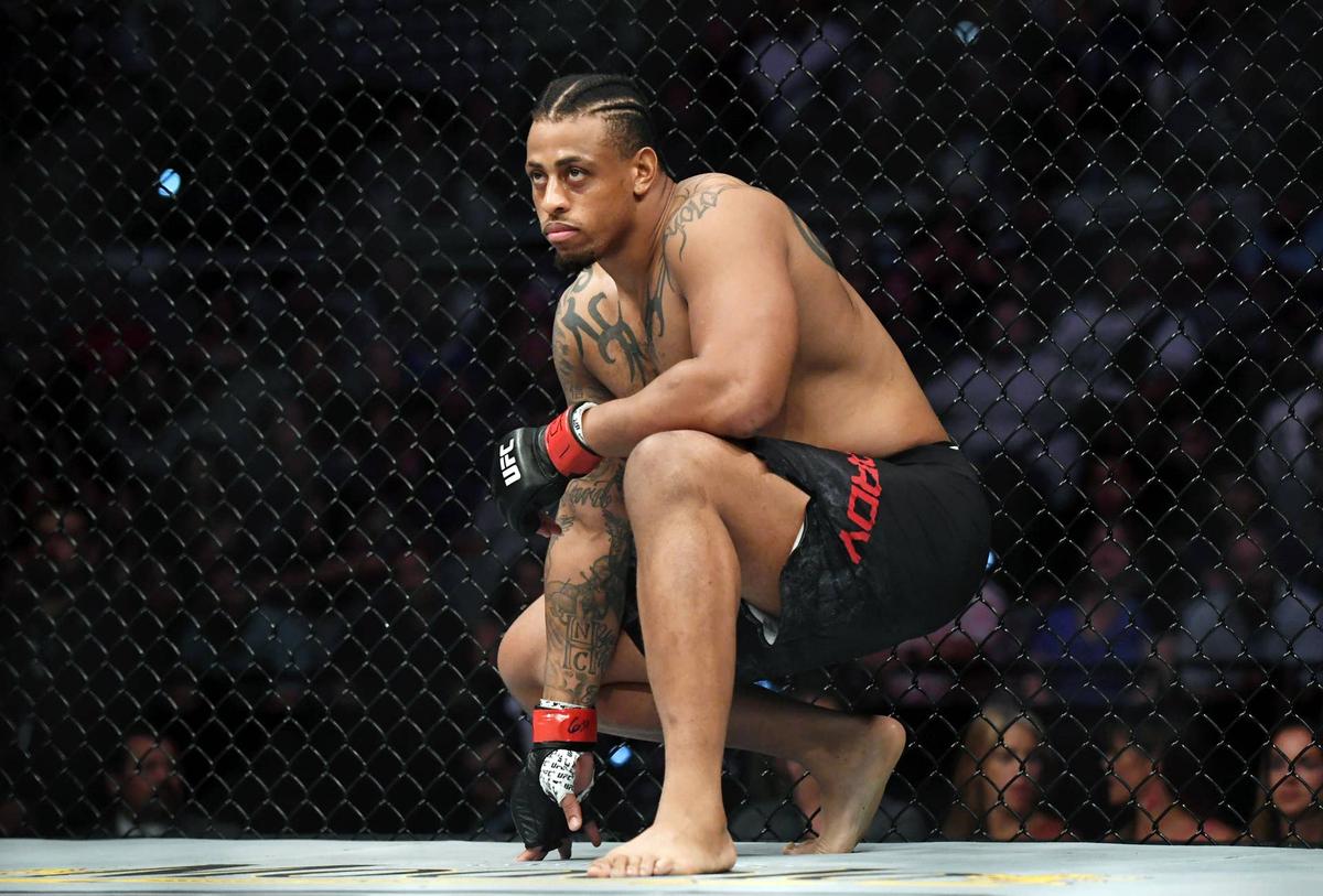  Jul 20, 2019; San Antonio, TX, USA; Greg Hardy (red gloves) before his fight against Juan Adams (blue gloves) during UFC Fight Night at AT&T Center. Hardy won the fight by technical knock out. Mandatory Credit: Adam Hagy-USA TODAY Sports 