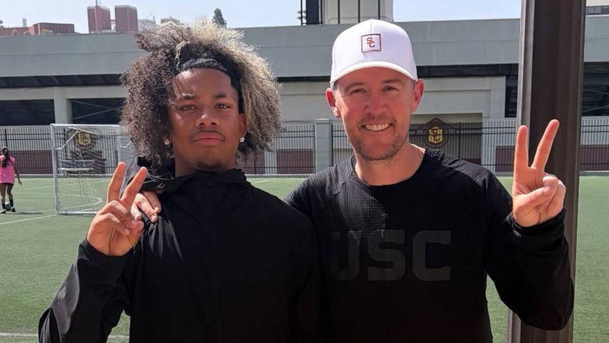  Victor Valley (Calif.) 2029 running back Makai Buchanan and USC Trojans head coach Lincoln Riley | Photo courtesy of Makai Buchanan 