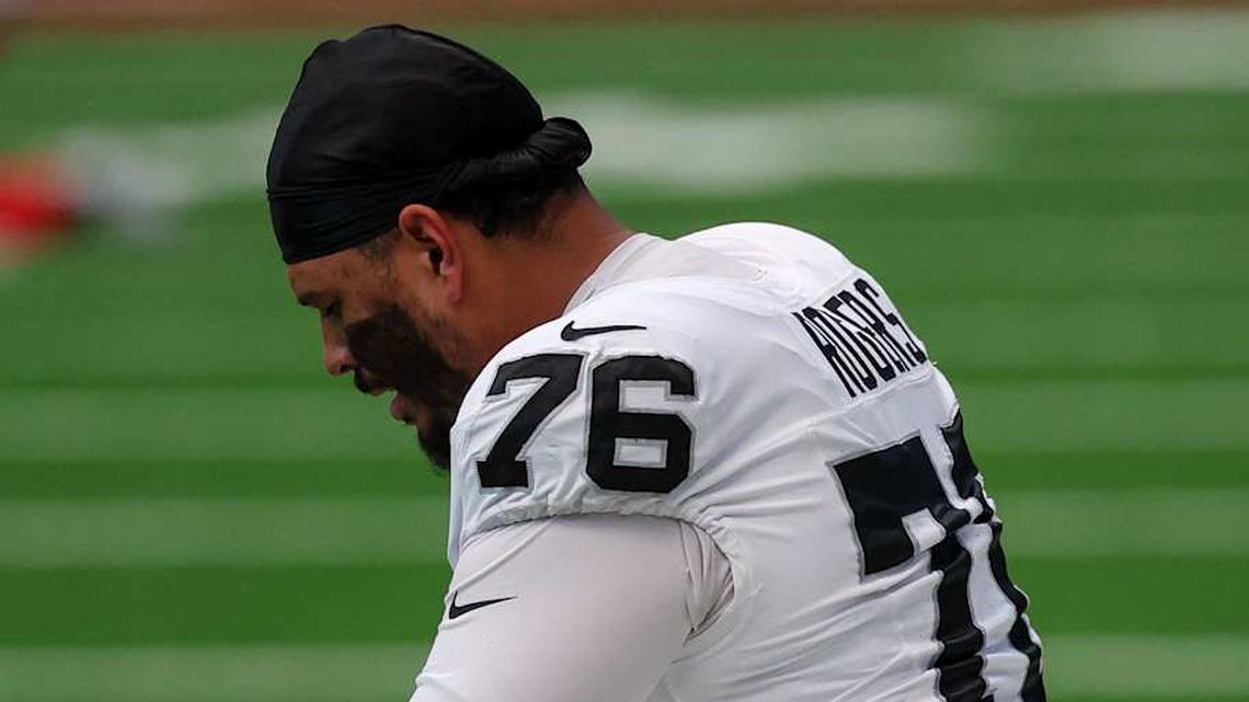  Dec 21, 2025; Houston, Texas, USA; Las Vegas Raiders guard Caleb Rogers (76) prays on the sidelines before playing against the Houston Texans at NRG Stadium. Mandatory Credit: Thomas Shea-Imagn Images | Thomas Shea-Imagn Images 