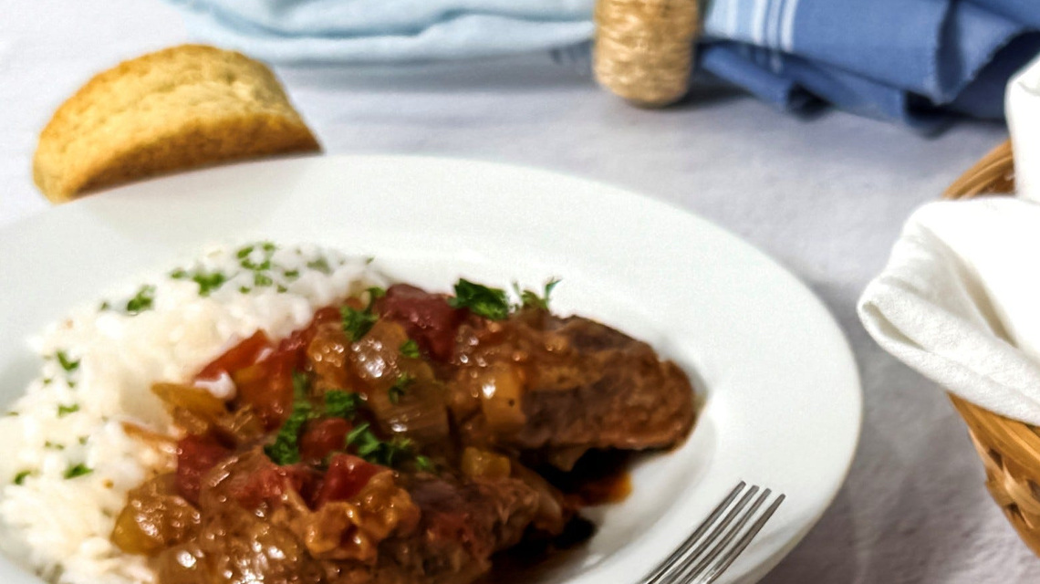 Slow simmer makes hearty gravy for Classic Swiss Steak 
