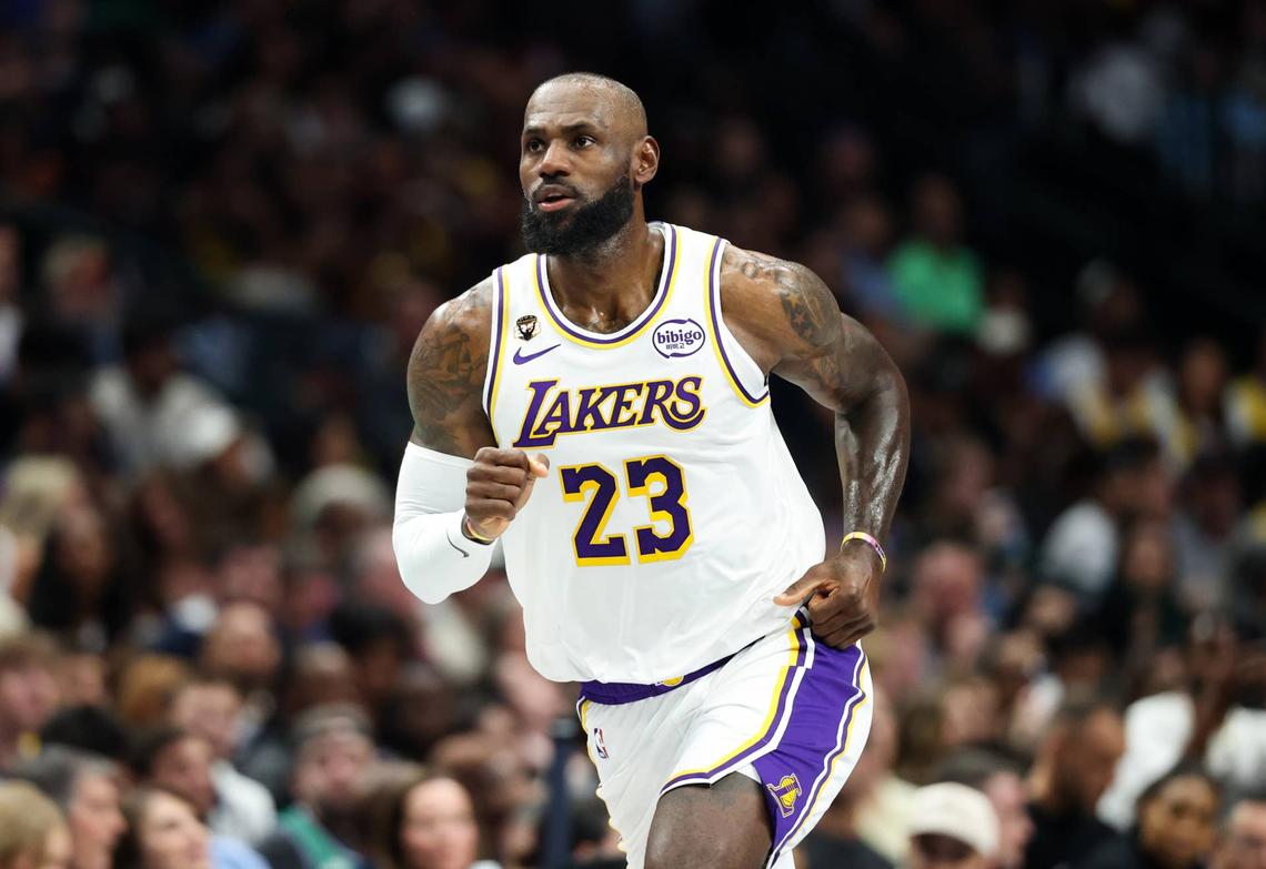  Lakers forward LeBron James (23) reacts after scoring Kevin Jairaj-Imagn Images