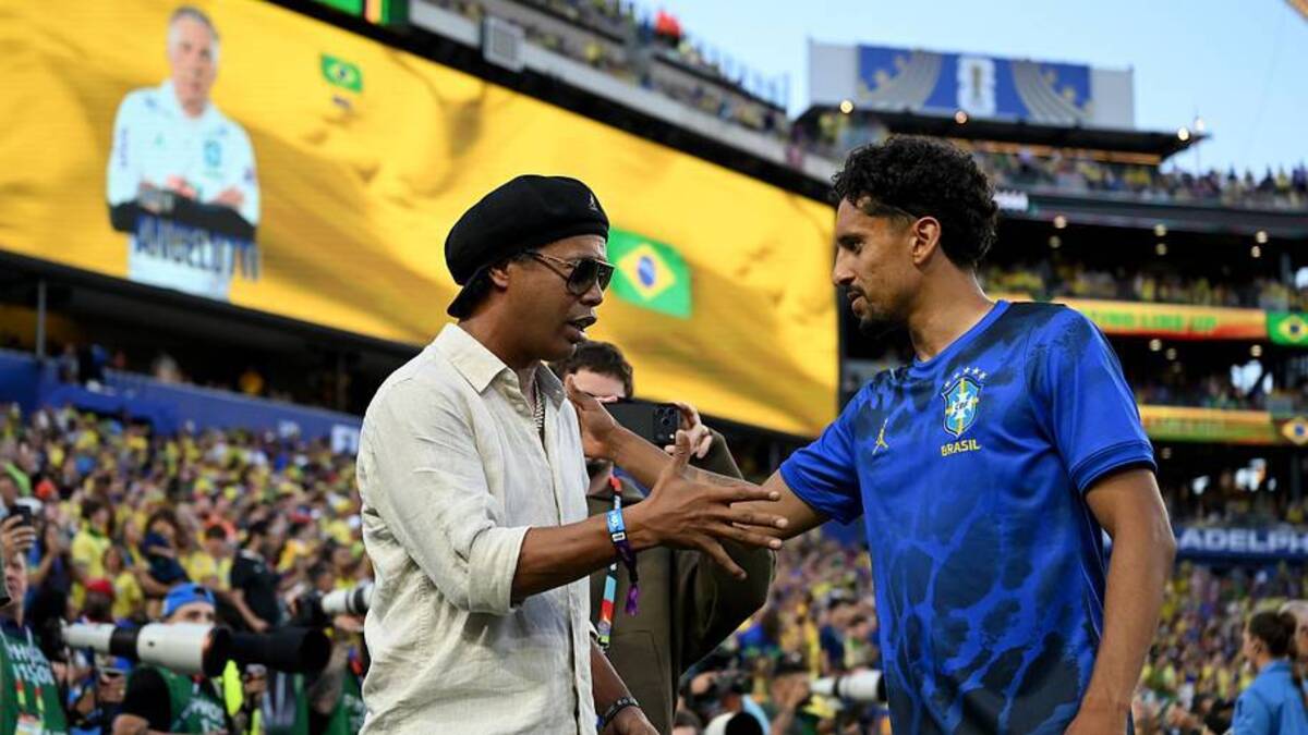  Ronaldinho (left) has been spotted at the World Cup. | Shaun Botterill/FIFA/Getty Images 