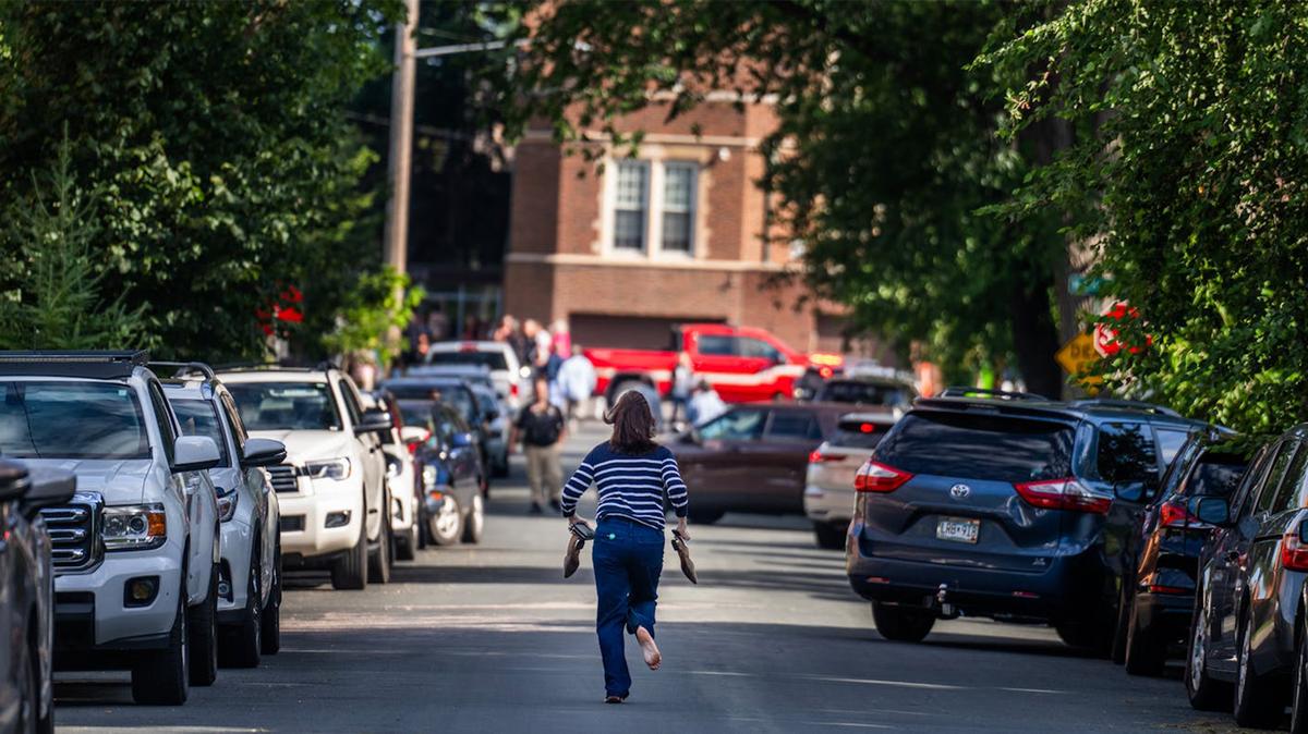 The Minnesota Star Tribune received the Pulitzer Prize for Breaking News for its coverage of the shooting at Annunciation Catholic Church during a welcome back mass for its school. The entry included this photo by Richard Tsong-Taatarii of an unidentified parent running toward the school. (Richard Tsong-Taatarii/The Minnesota Star Tribune/TNS)