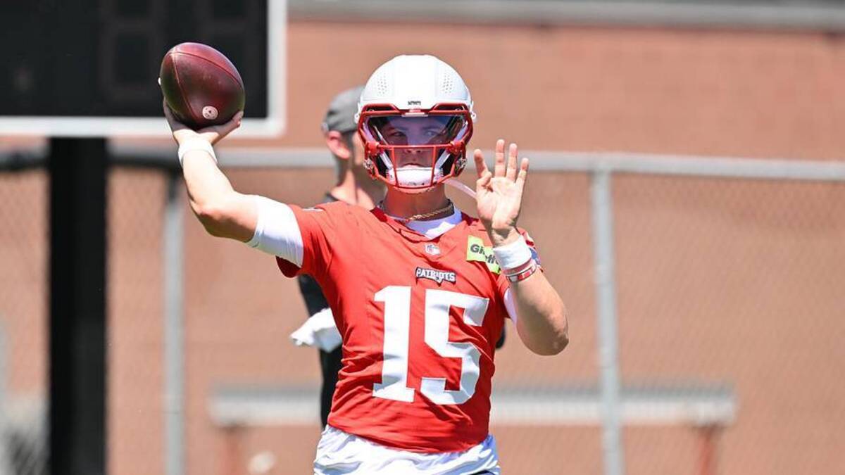  Jun 9, 2026; Foxborough, MA, USA; New England Patriots quarterback Behren Morton (15) throws a pass during minicamp at Gillette Stadium. Mandatory Credit: Eric Canha-Imagn Images | Eric Canha-Imagn Images 