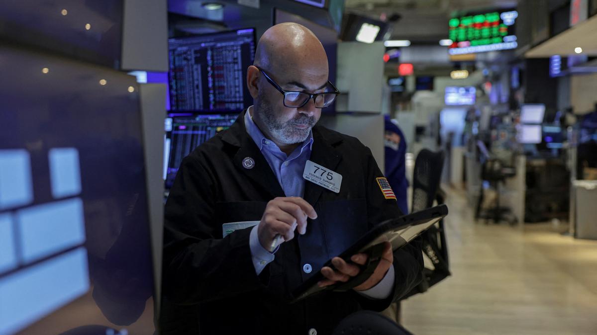 A trader works on the floor at the New York Stock Exchange (NYSE) in New York City, U.S., May 1, 2026. REUTERS/Jeenah Moon