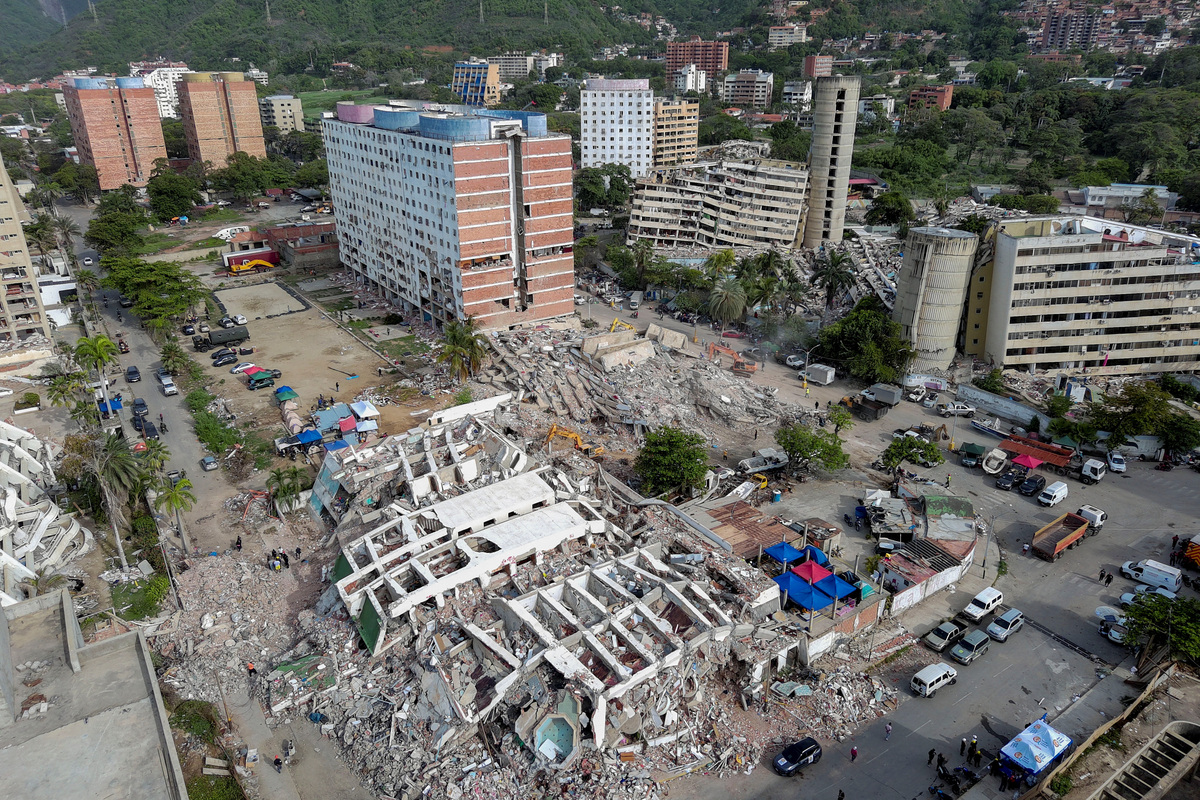 A drone view shows the remains of the apartment building where Maria Alejandra Sanz was trapped after twin earthquakes struck La Guaira, Venezuela, July 4, 2026. REUTERS/Ricardo Arduengo