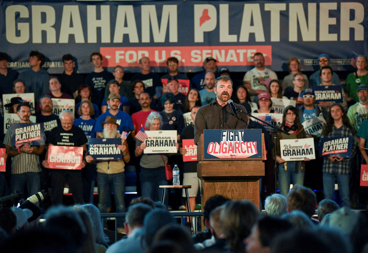 FILE PHOTO: Graham Platner, Democratic candidate for U.S. Senate in Maine, speaks during a "Fighting Oligarchy" campaign rally with U.S. Senator Bernie Sanders (I-VT) in Portland, Maine, U.S., May 25, 2026.   REUTERS/Amanda Sabga/File Photo