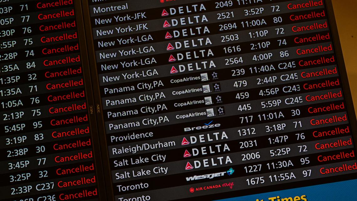 Screens showing canceled flights at Orlando International Airport, closed to commercial flights ahead of Hurricane Milton's arrival in Florida on Oct 9, 2024. Milton regained power on October 8 to become a Category 5 storm with maximum sustained winds of 165 mph (270 kph) as it barrels towards the west-central coast of Florida and is forecast to make landfall late October 9, according to the National Hurricane Center.