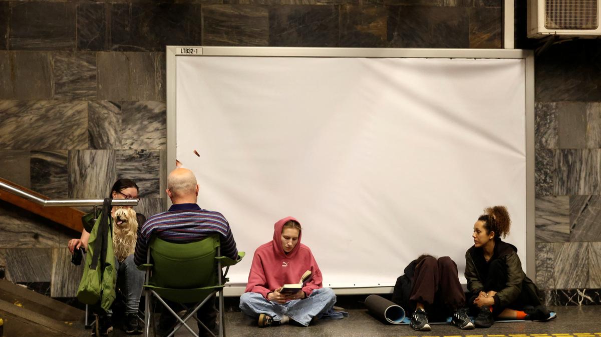 People shelter in a metro station during Russian missile and drone attacks, amid Russia's attack on Ukraine, in Kyiv, Ukraine May 24, 2026. REUTERS/Thomas Peter