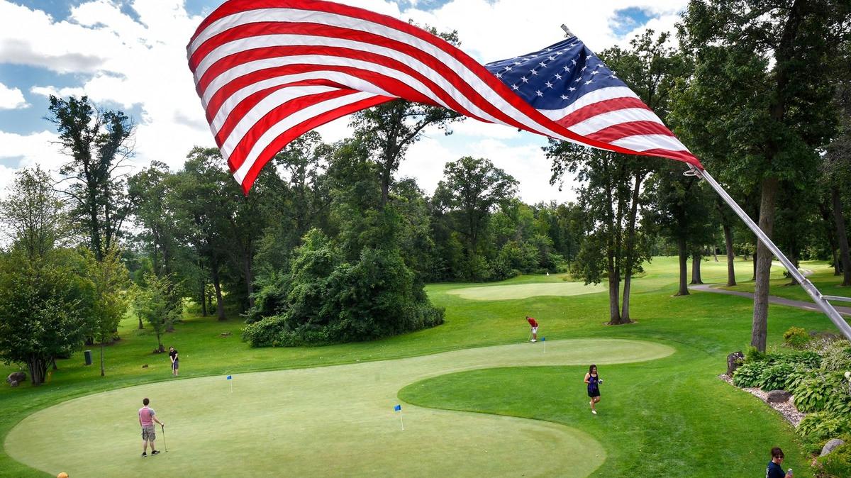 The American flag waves gracefully over the practice green at Blackberry Ridge Golf Course & Event Center in Sartell. Dave Schwarz, dschwarz@stcloudtimes.com