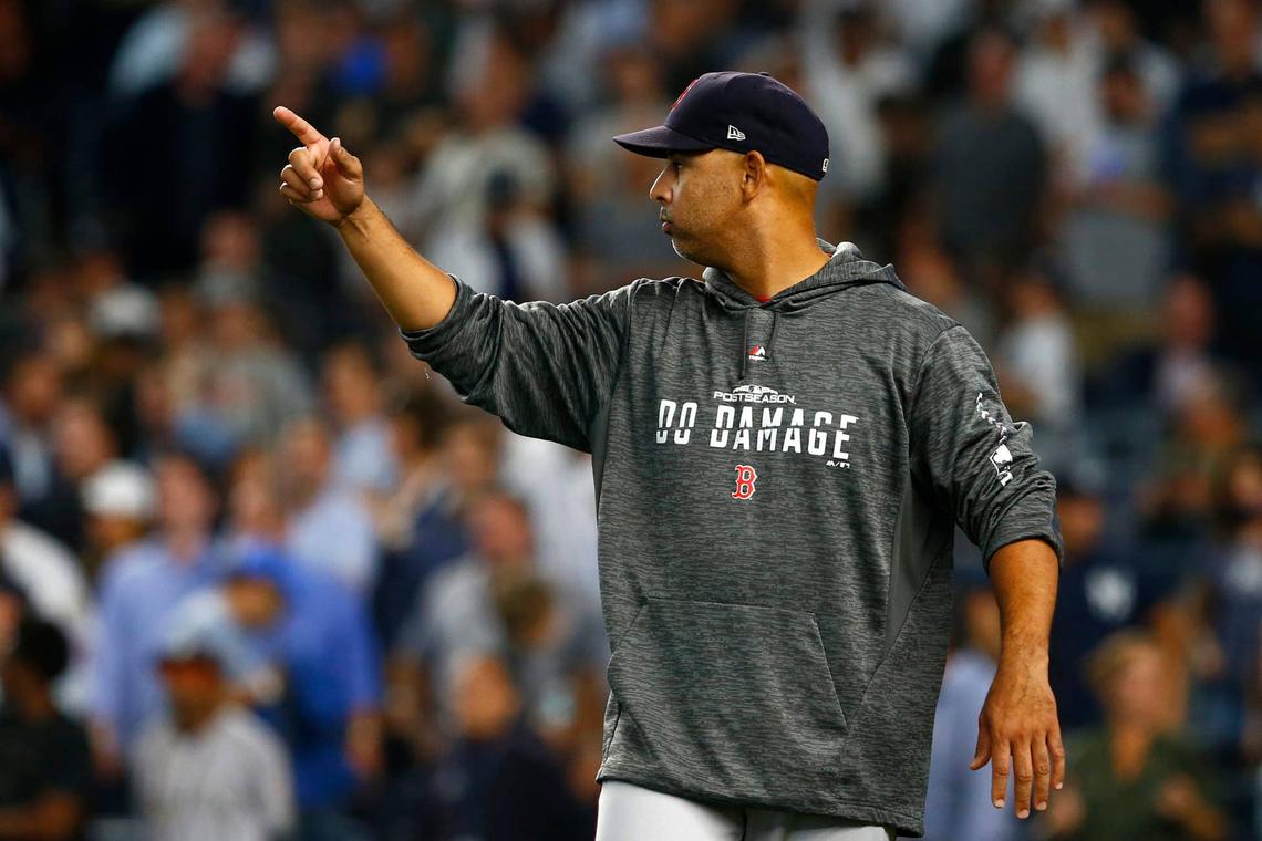  NEW YORK, NEW YORK - OCTOBER 09: Alex Cora #20 of the Boston Red Sox reacts against the New York Yankees during the eighth inning in Game Four of the American League Division Series at Yankee Stadium on October 09, 2018 in the Bronx borough of New York City. (Photo by Mike Stobe/Getty Images) 