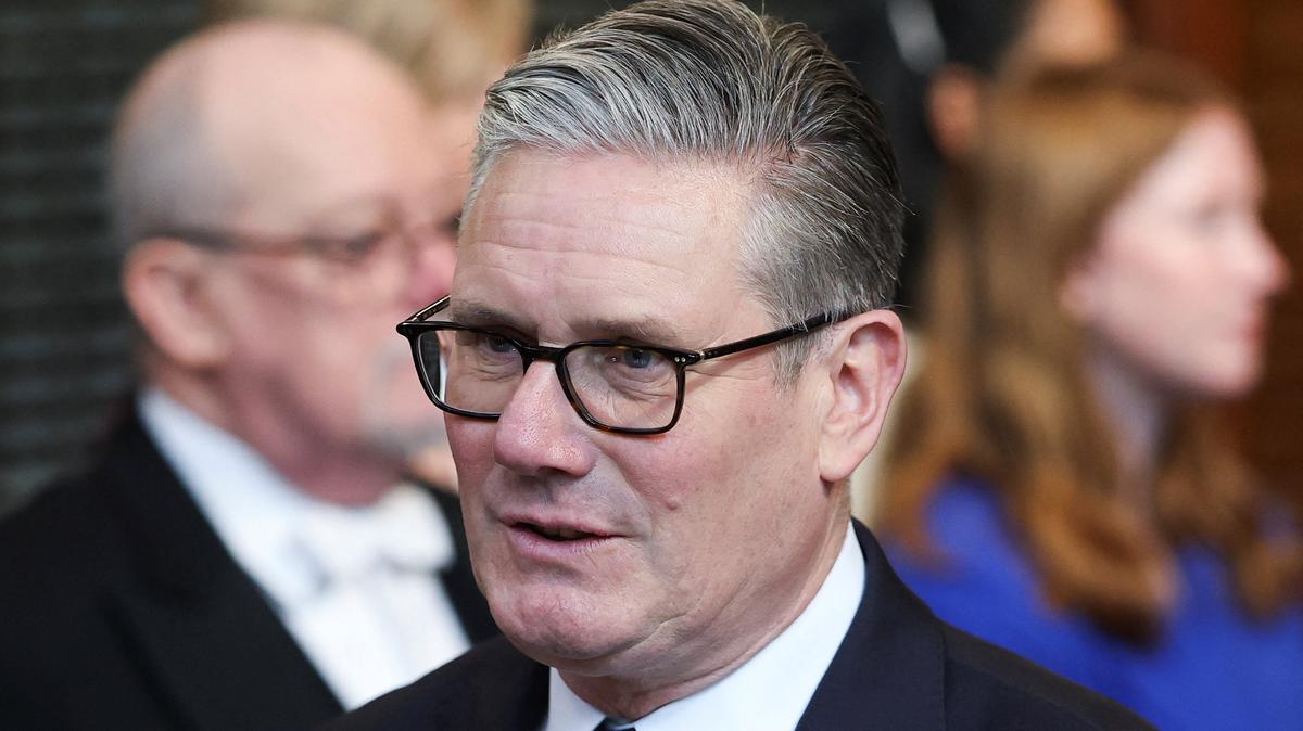 British Prime Minister Keir Starmer walks through the House of Commons to attend the State Opening of Parliament at the Palace of Westminster, London, Britain, May 13, 2026. REUTERS/Toby Melville/Pool