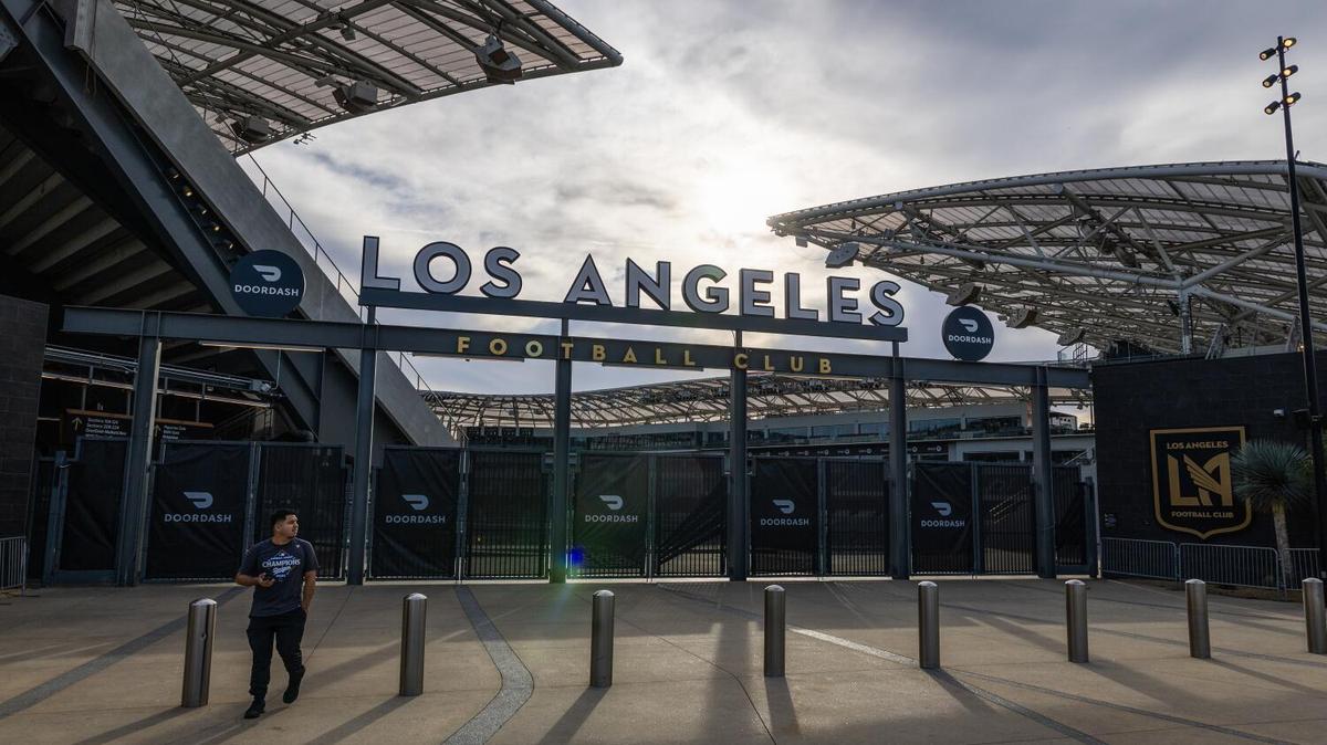 A person walks by the entrance to the BMO Stadium at Exposition Park in Los Angeles on Wednesday, Jan. 27, 2026. Exposition Park is expected to receive nearly $100 million for beautification and other improvements ahead of upcoming major events such as the World Cup and the 2028 Olympic Games. (Allen J. Schaben/Los Angeles Times/TNS)