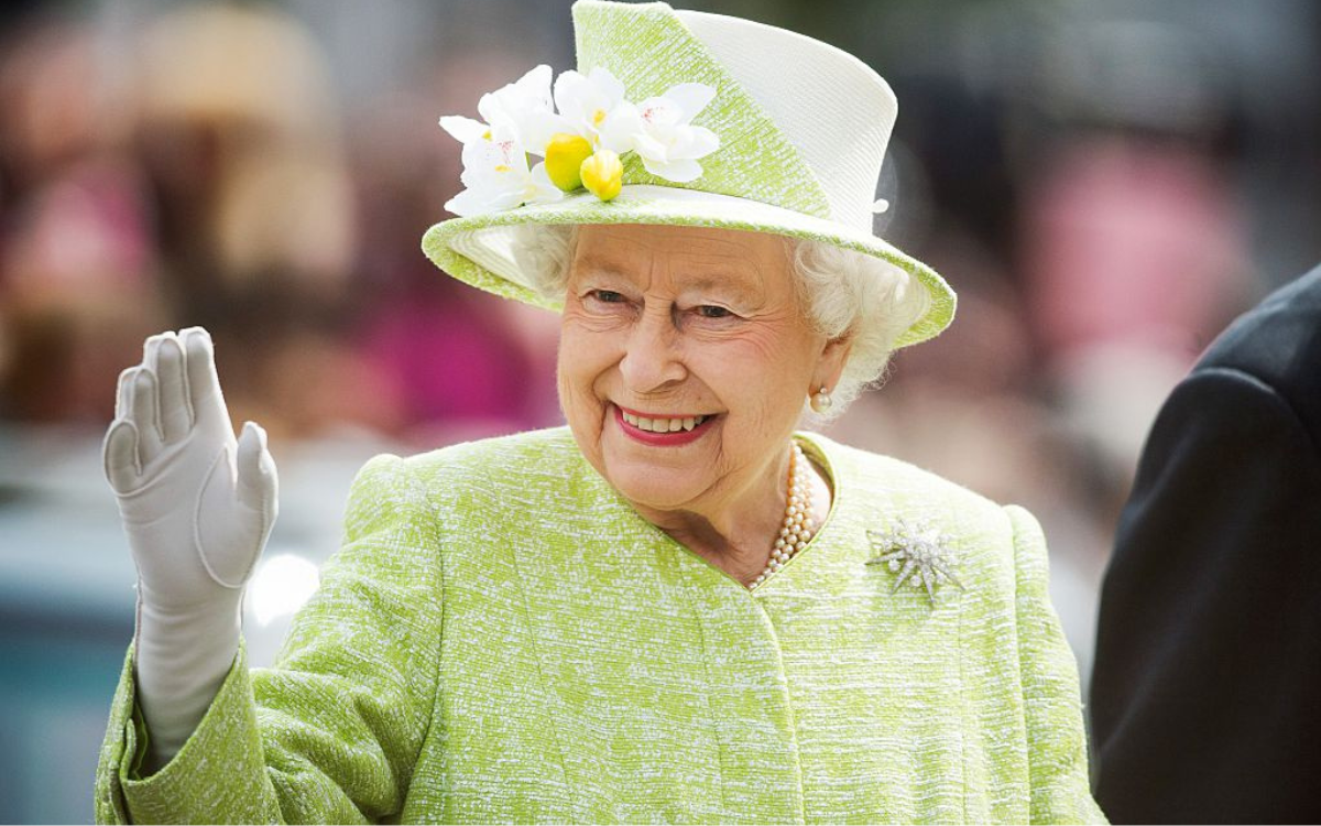  Queen Elizabeth II waves during a walk about around Windsor on her 90th Birthday on April 21, 2016 in Windsor, England. 