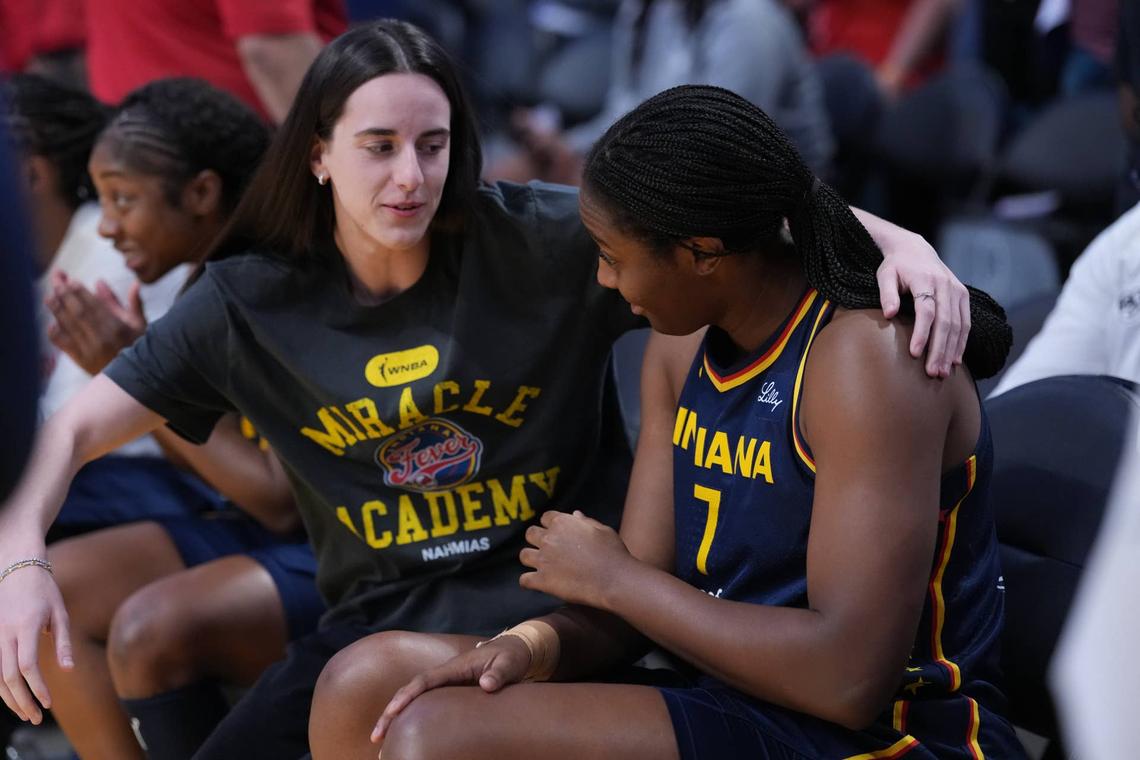  Indiana Fever guard Caitlin Clark (22) gives a hug to forward Aliyah Boston. Kirby Lee-Imagn Images