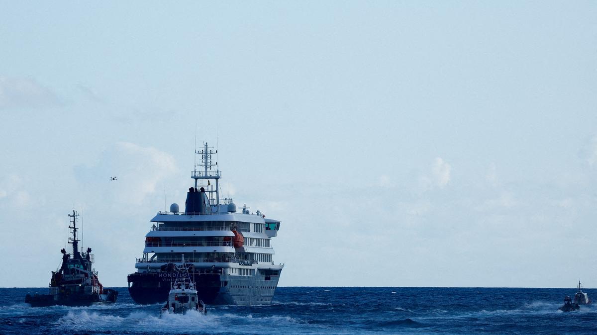 FILE PHOTO: The cruise ship MV Hondius, affected by a hantavirus outbreak, leaves the port of Granadilla de Abona, Tenerife, Spain May 11, 2026. REUTERS/Borja Suarez/File Photo