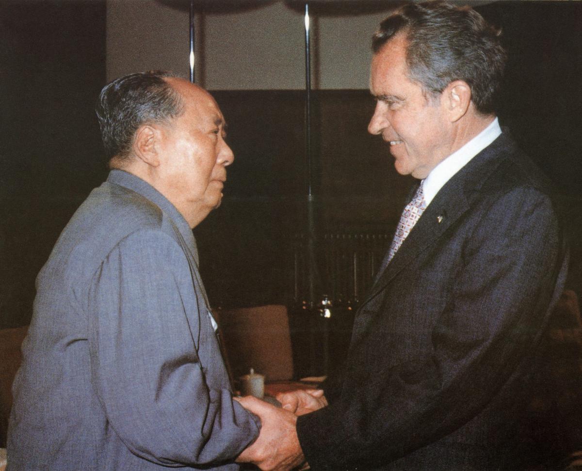  Chinese Communist Party Chairman Mao Zedong welcomes U.S. President Richard Nixon to his house in Beijing in 1972. AFP via Getty Images 