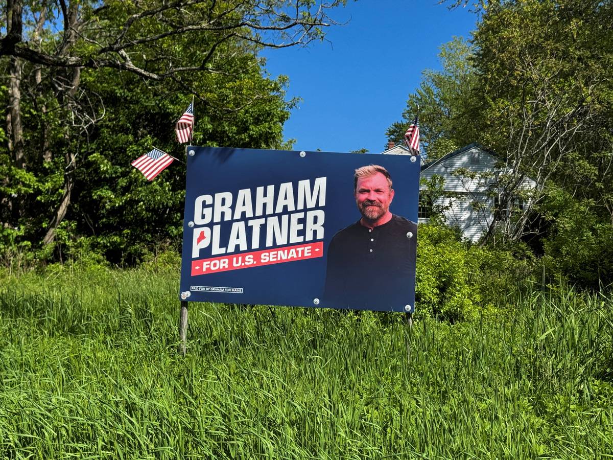 FILE PHOTO: An election sign for Democratic Senate candidate Graham Platner stands outside a home near Verona Island, in rural Maine, U.S., on June 3, 2026. REUTERS/Aleksandra Michalska/File Photo