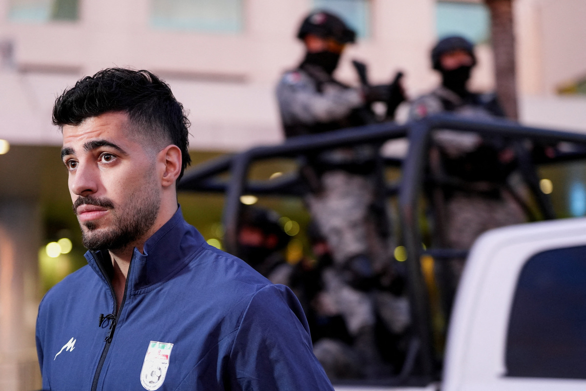 Iran player Saeid Ezzatollahi speakes during an interview with Reuters after 15 Iranian soccer federation members denied visas to travel to the U.S. for the World Cup games, at a hotel in Tijuana, Mexico, June 11, 2026. REUTERS/Aimee Melo