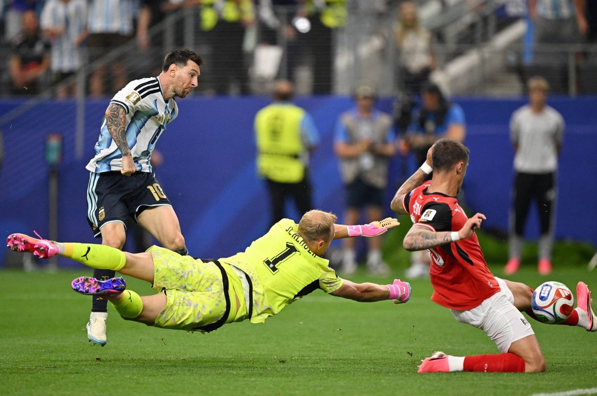  Argentina's Lionel Messi scores their second goal. 