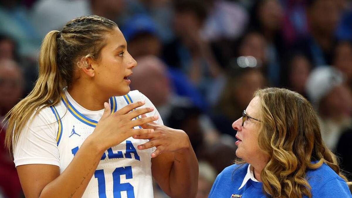  Apr 5, 2026; Phoenix, AZ, USA; UCLA Bruins forward Sienna Betts (16) with head coach Cori Close against the South Carolina Gamecocks during the National Championship game of the women's 2026 NCAA Tournament at Mortgage Matchup Center. Mandatory Credit: Mark J. Rebilas-Imagn Images | Mark J. Rebilas-Imagn Images 